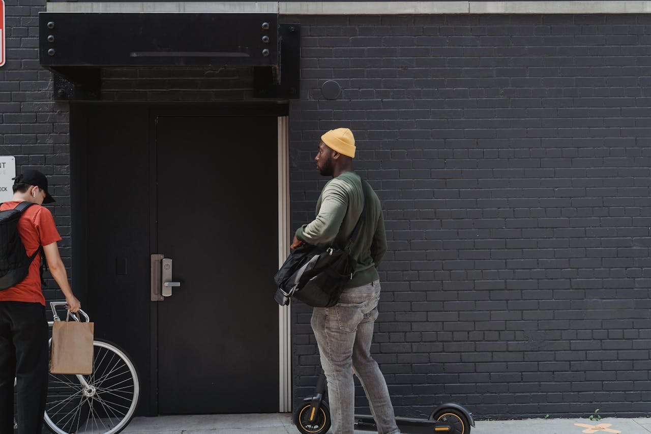 Courier dropping off delivery for business