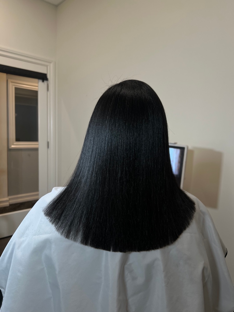 Smooth silk press hairstyle by MBThairapy